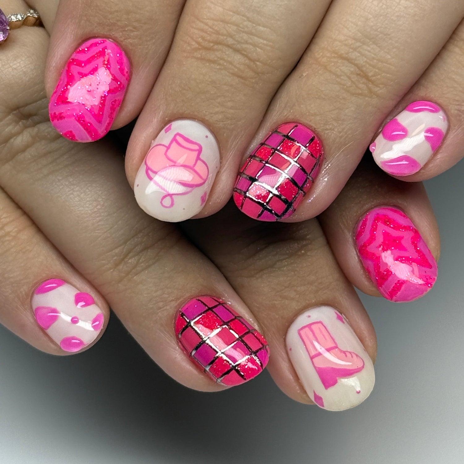 Clients nails with Pink Disco Cowgirl freestyle Nail art